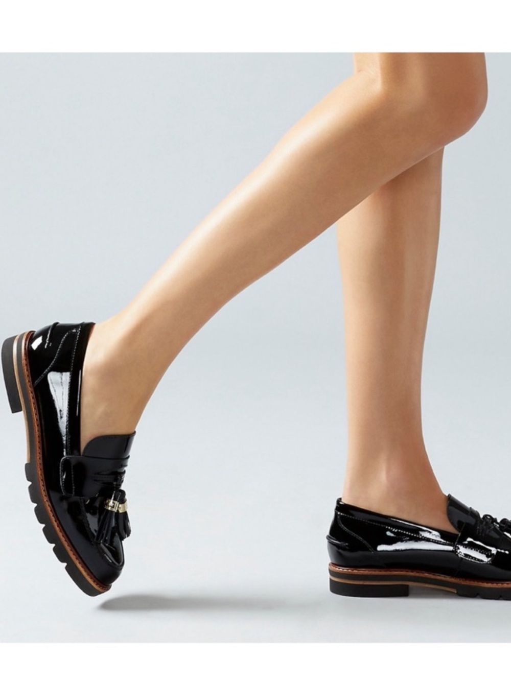 Stuart Weitzman Black Patent leather Tassel Loafers with Brown Trim